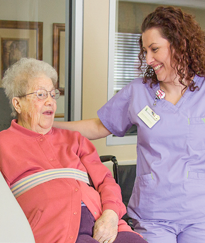 Therapist and patient smiling