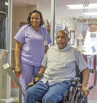nurse and patient smiling