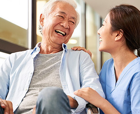 nurse with patient in wheelchair