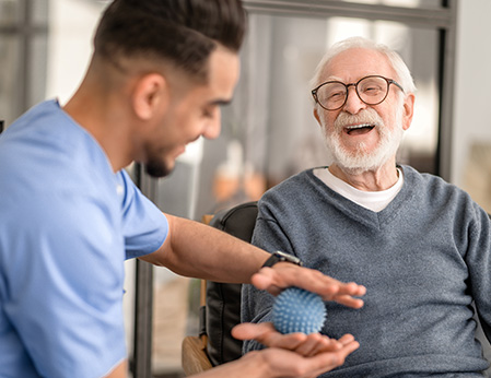 therapist and patient smiling